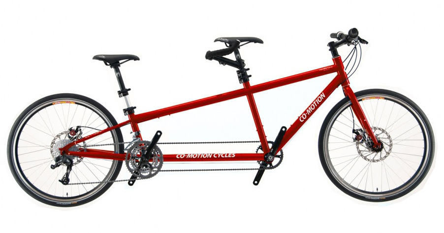 Co-Motion Road Bike Tandem, red with two seats and handlebars, shown from the side on a white background.