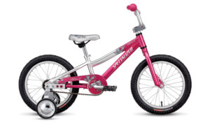 Specialized HotRock 16" kids' bike with training wheels, padded seat, and pink/silver frame.